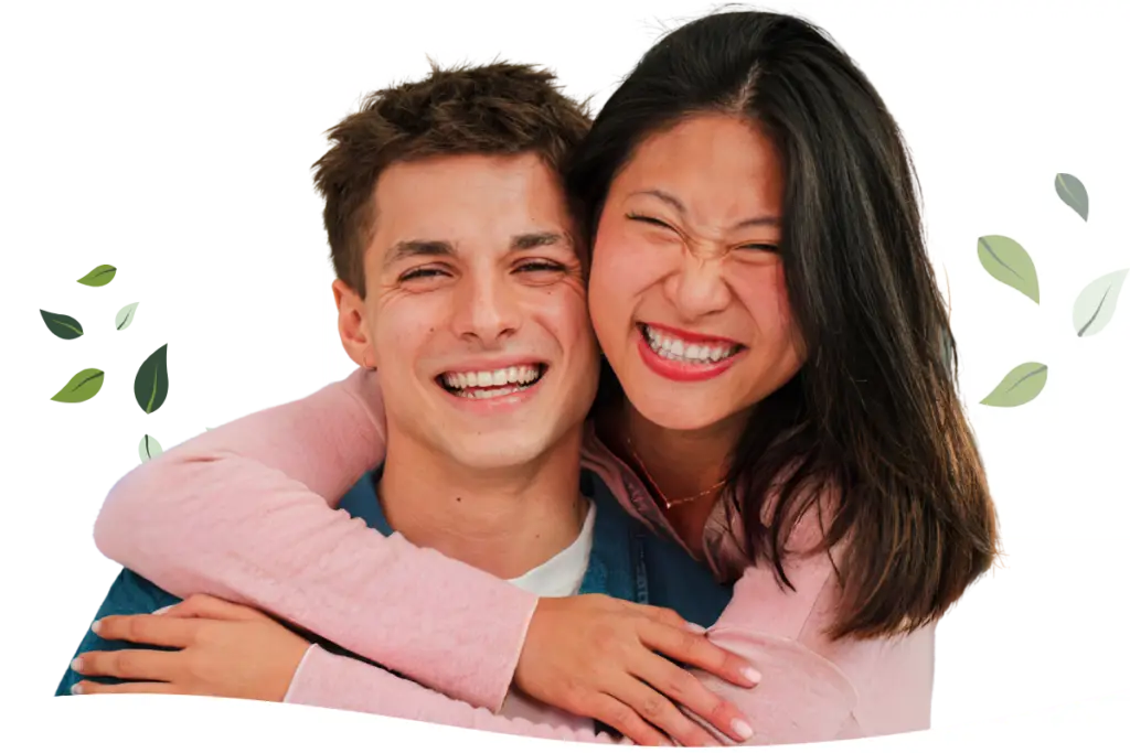 young couple wearing clear aligner trays to correct teeth in oakton virginia