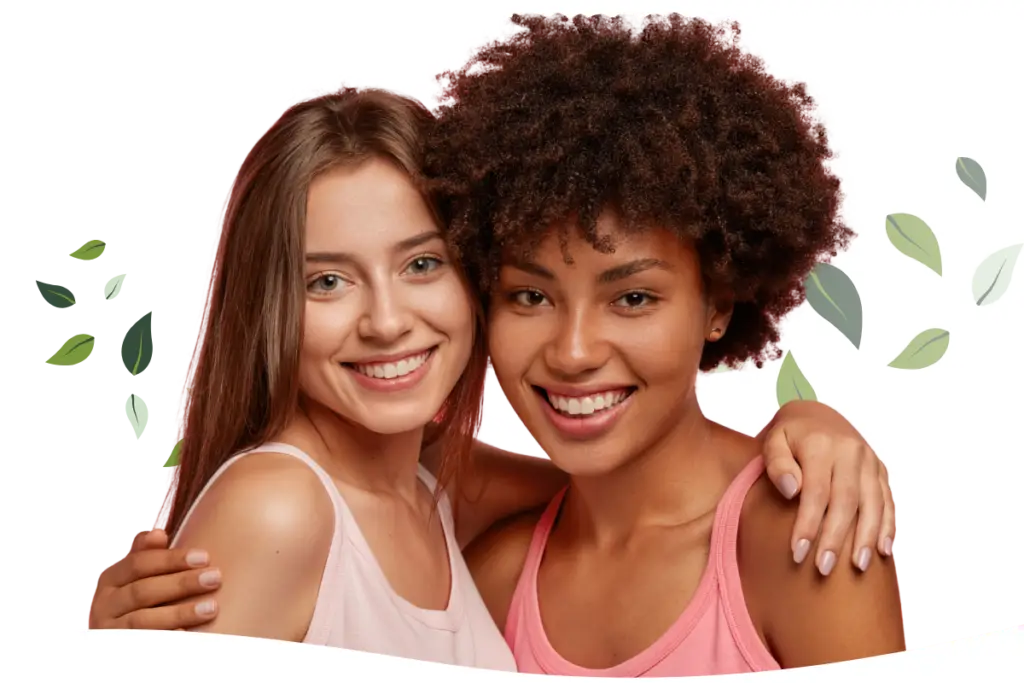 beautiful teens showing off the smiles they retain with retainers following ortho treatment